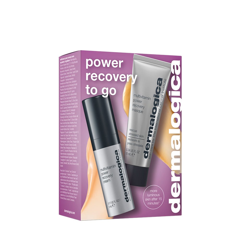 „Recovery To Go“-Set – Dein Geschenk! Schachtel mit „Multivitamin Power Recovery Masque“ und „Multivitamin Power Recovery Cream“ vor violettem Hintergrund; kein Verkaufsartikel.
