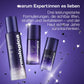 Drei violette Hautpflegeprodukte von Dermalogica aus dem „The Expert Lift Set“ sind aufrecht auf einem violetten Hintergrund mit schwebendem schwarz-weißem Konfetti abgebildet, begleitet von einem deutschen Werbetext über ihre Vorteile für „Longevity Haut“ und die sichtbare Bekämpfung von Hautalterung.