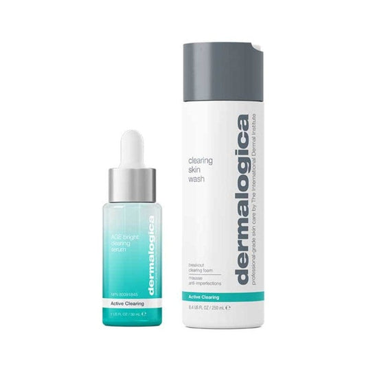 Age Bright Clearing Serum mit Salicylsäure in einer Tropfflasche und Clearing Skin Wash in einer zylindrischen Flasche - beides aus der Active Clearing-Linie von Dermalogica zur gezielten Behandlung von Hautunreinheiten.