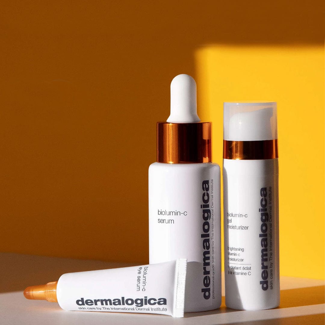 Aufhellendes Biolumin-C Trio | Vitamin C Pflegeset mit zwei Gratis-Produkten von Dermalogica auf gelbem Hintergrund, für ein strahlendes Hautbild